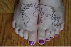 Purple nails and map tattoo on legs