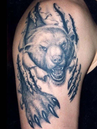 Realistic black bear tattoo on arm