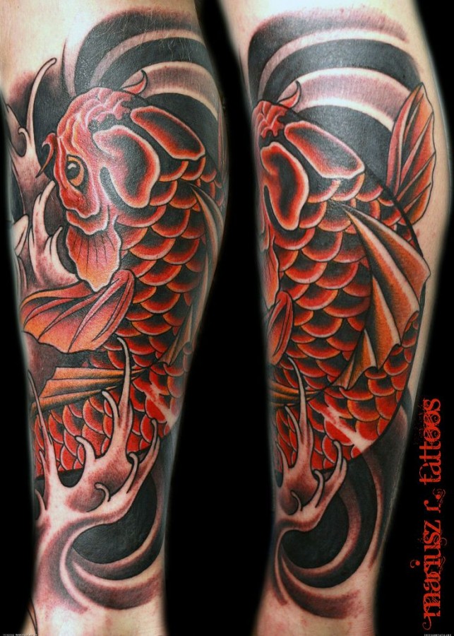 Red and black amazing fish tattoo on leg