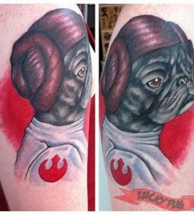 Red and black dog tattoo on arm