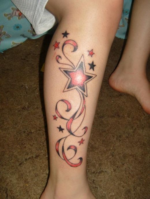 Red cool star tattoo on leg