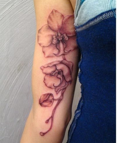 Red flower interesting design tattoo