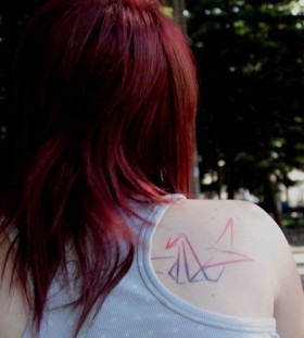 Red hair girl origami tattoo on shoulder