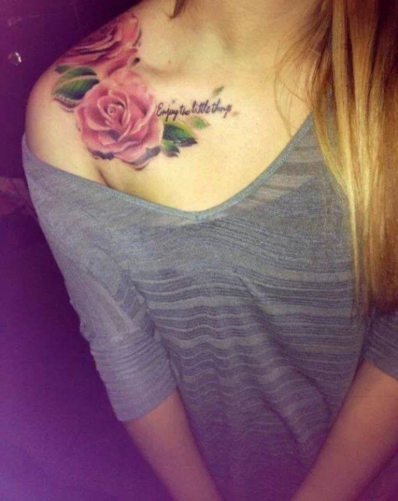 Red lovely rose tattoo on shoulder