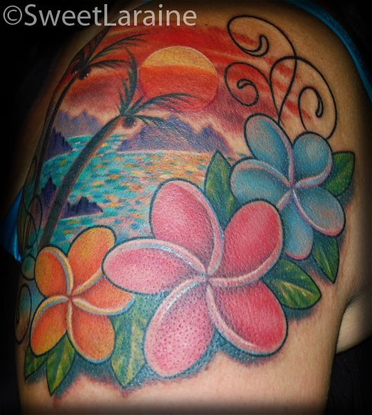 Red, pink, blue hawaiian style tattoo