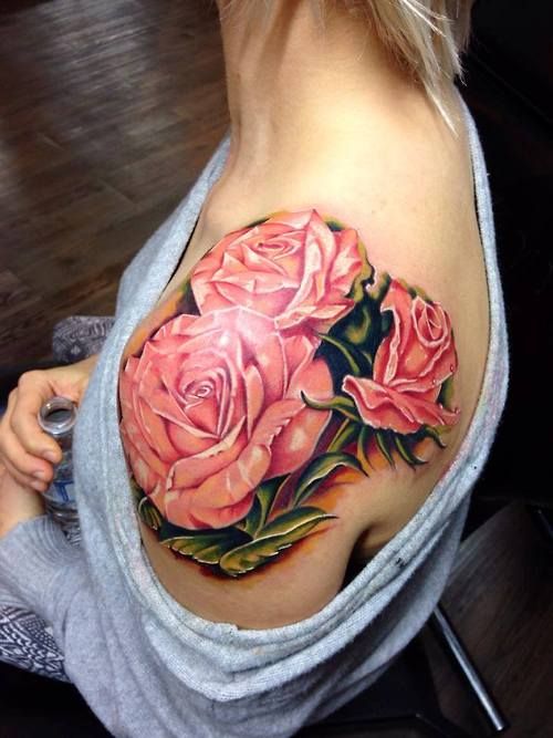 Red pretty roses tattoo on shoulder