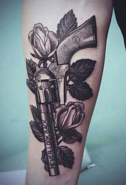 Red roses and gun tattoo