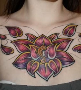 Red simpe flower tattoo on chest