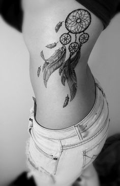 Side dream catcher tattoo