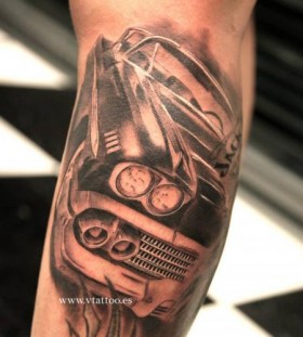 Simple black car tattoo on arm