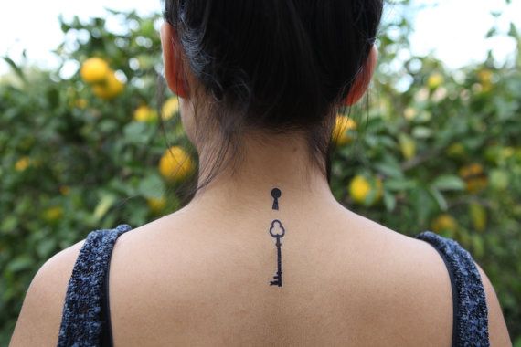 Simple black lovely keyhole tattoo