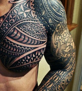 Simple black tribal tattoo on arm