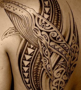 Simple black tribal tattoo on shoulder