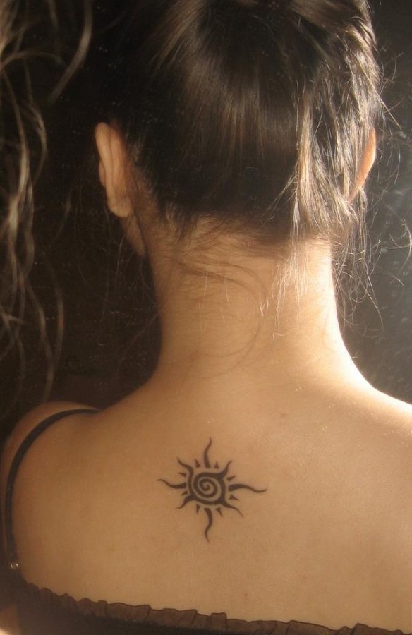 Simple lovely back sun tattoo