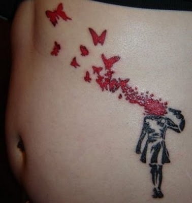 Simple small red butterfly tattooo