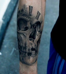 Skull and amazing number tattoo on arm