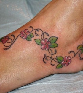 Small ankle hawaiian style tattoo