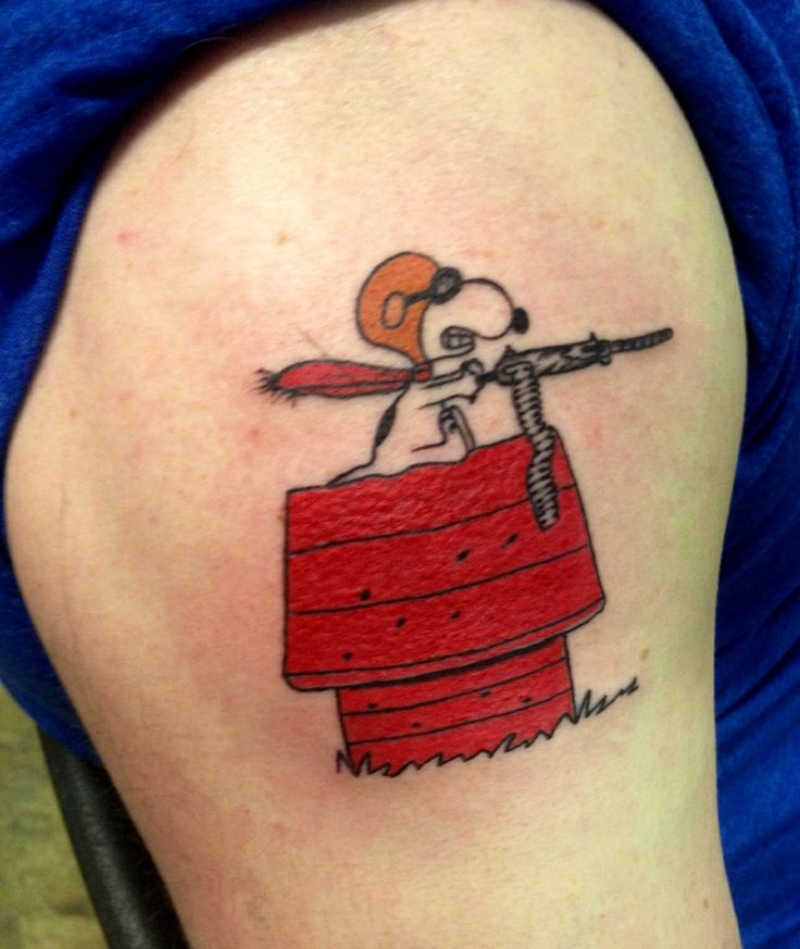 Snoopy with gun tattoo