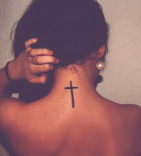 Stylish simple back cross tattoo