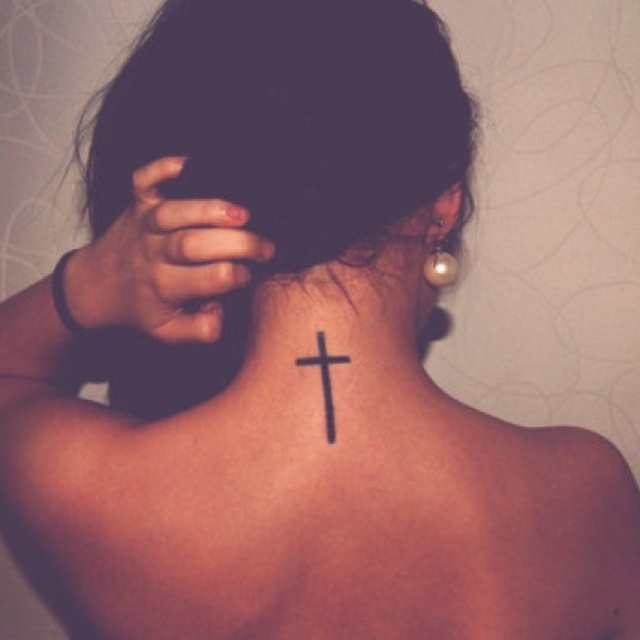 Stylish simple back cross tattoo