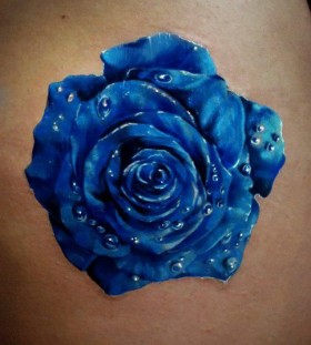 Water droplets and blue flowers tattoos