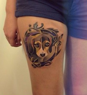 Watercolor sad dog tattoo on leg