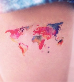 Watercolor world map tattoo on legs