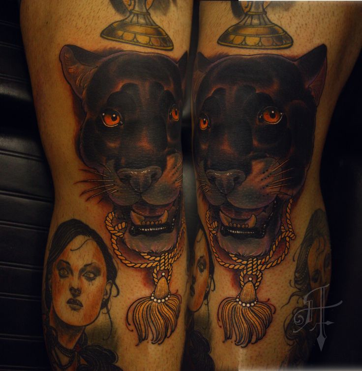 Women and black tiger tattoo on leg