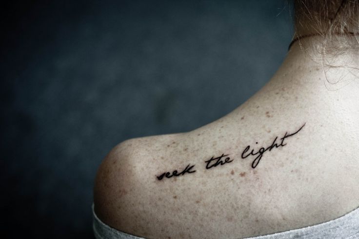 see the light black shoulder tattoo