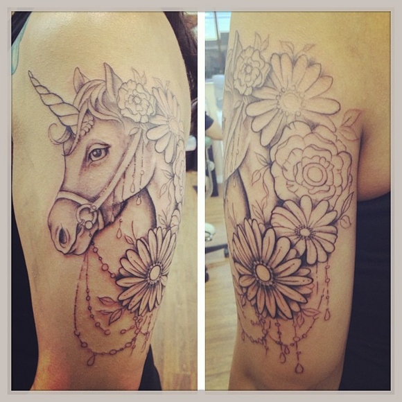 unicorn tattoo with flowers