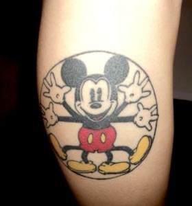 Adorable black and white Mickey Mouse tattoo on leg