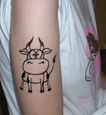 Adorable, cute cow tattoo