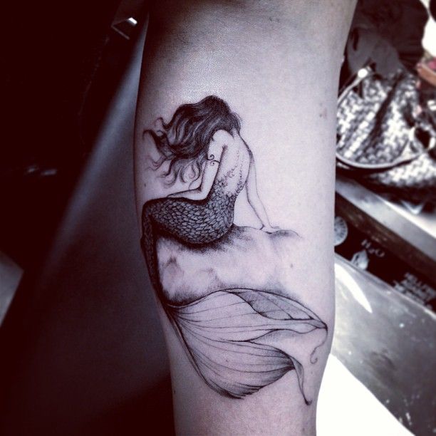 Adorable girl mermaid tattoo