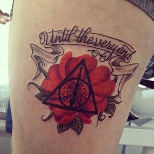 Adorable red flower and Harry Potter tattoo