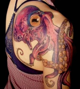 Amazing purple octopus tattoo on arm