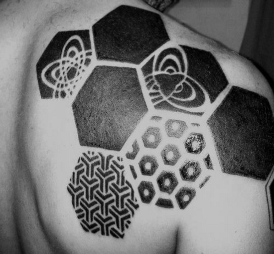 Astro style black geometric shoulder, back tattoo