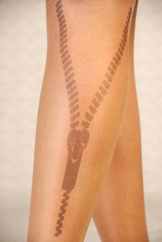 Awesome black zip tattoo