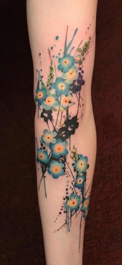 Awesome blue and yellow tattoo