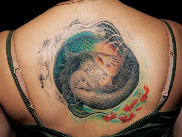 Back two amazing fishes and mermaid tattoo