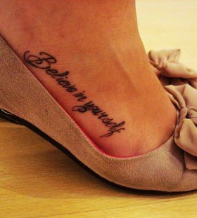 Believe in yourself girl tattoo on foot
