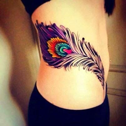 Black and purple girl tattoo on hip