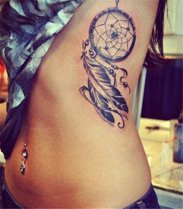 Black owal dreamcatcher tattoo