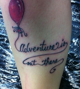 Black quote and balloon tattoo