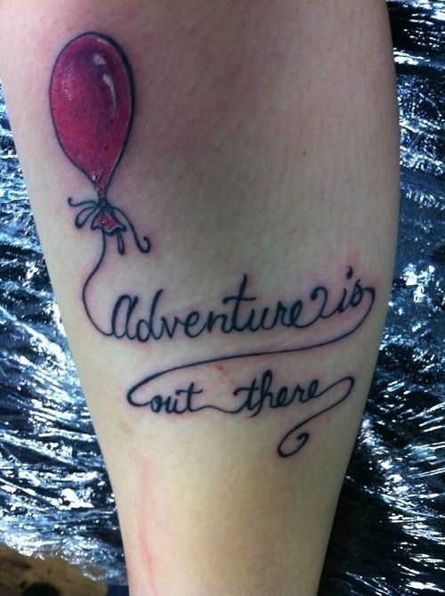 Black quote and balloon tattoo