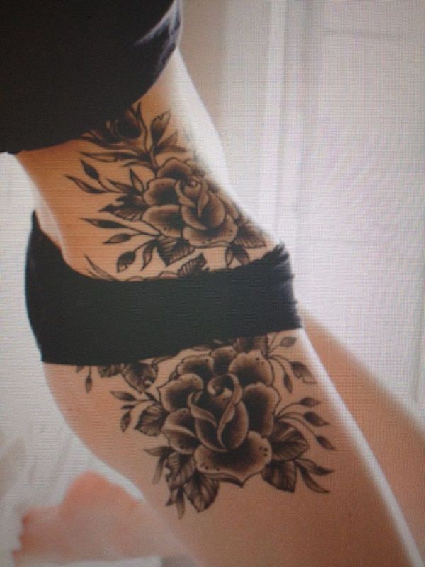 Black roses girl tattoo on hip