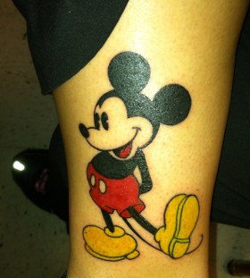 Cool smile Mickey Mouse tattoo on arm