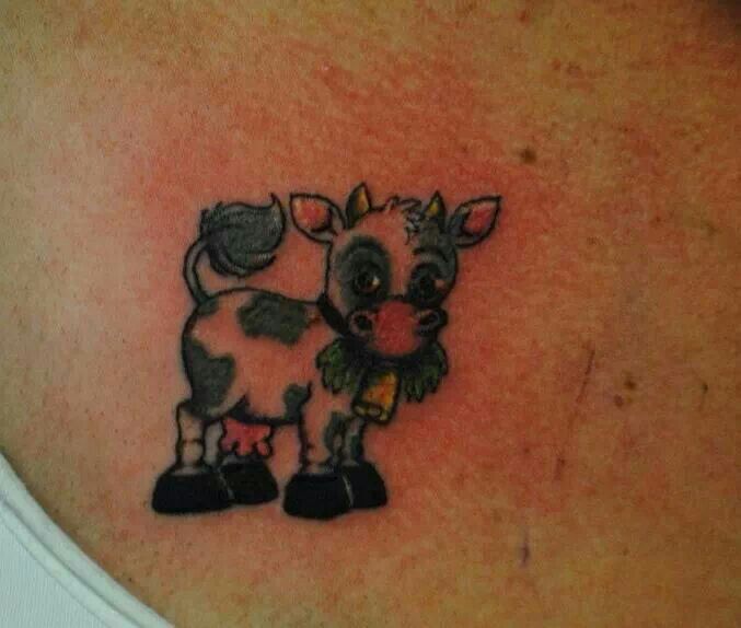 Cute blue cow tattoo