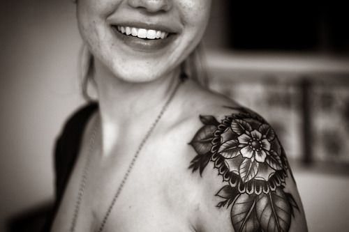 Cute smile and geometric shoulder, back tattoo