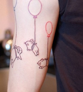 Funny rabits with balloon tattoo