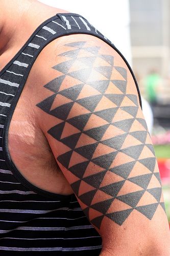 Geometric black geometric shoulder, back tattoo